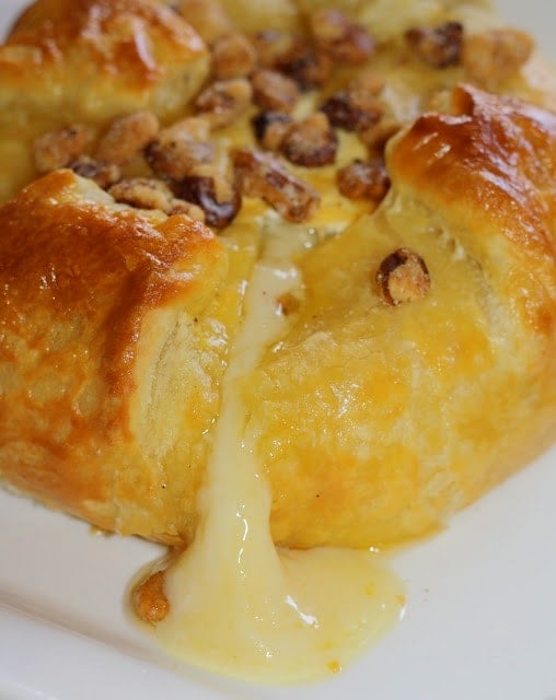 Baked brie on a white plate
