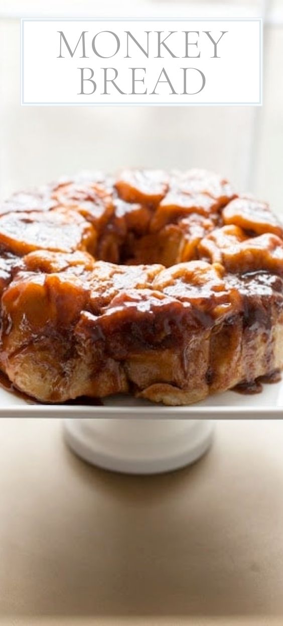 Monkey bread is pictured on a white serving stand.