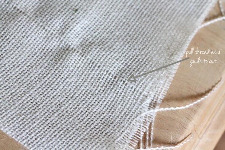 pull one thread from burlap to create a straight line