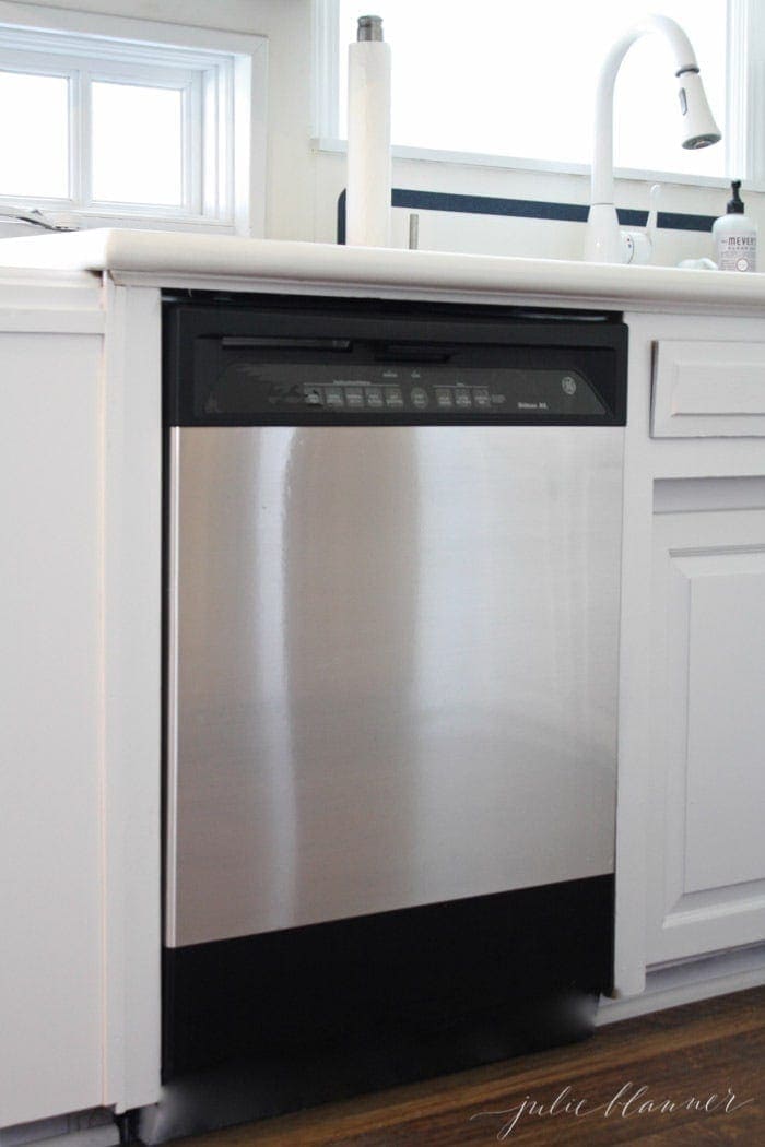 Covering Cabinets With Stainless Steel Peel and Stick Paper