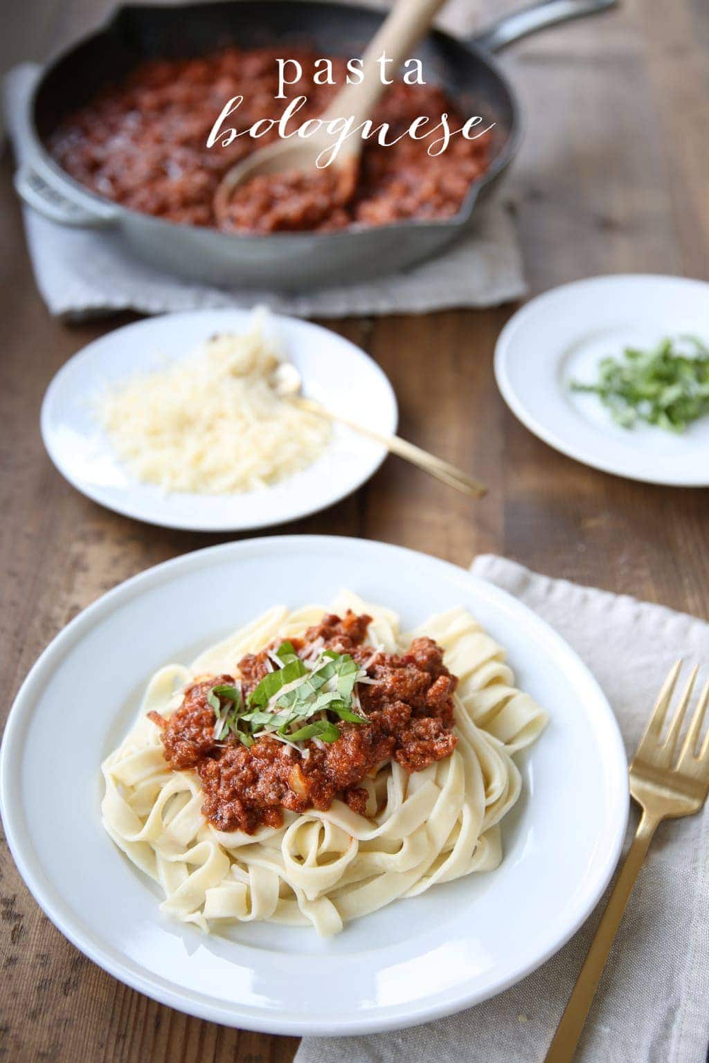 Bolognese served with pasta on a white plate