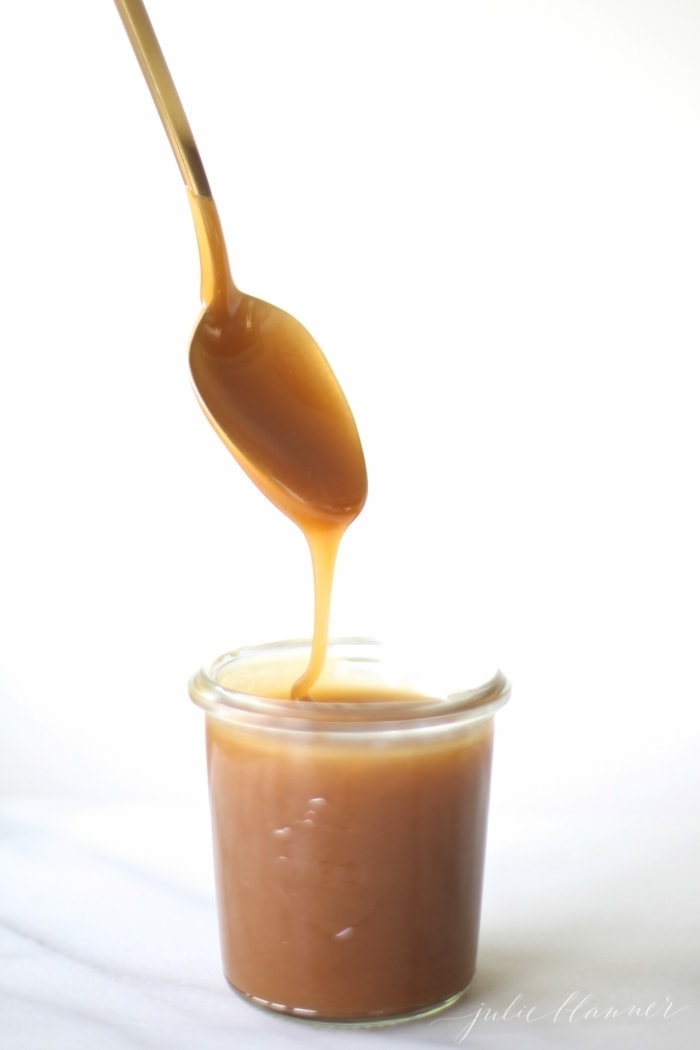 Fleur De Sel Caramel Sauce dripping off of a spoon
