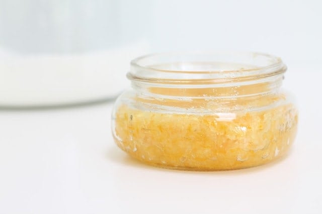 citrus sugar scrub next to jar of sugar