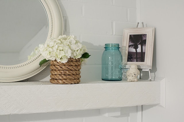 Flowers and pictures on a shelf