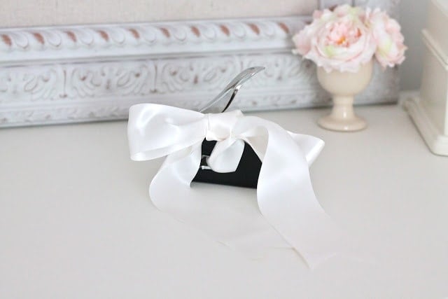 A white bow on a table