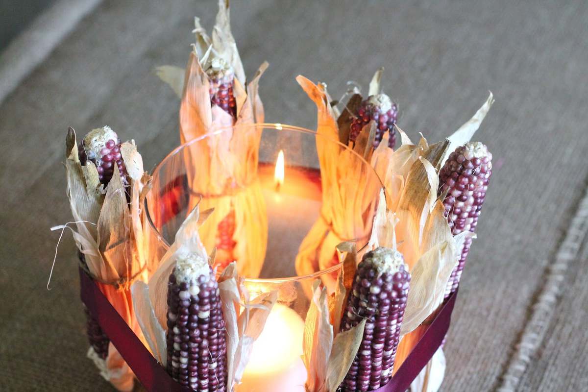 Dried corn centerpiece with a candle in the middle.