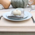 diy farmhouse table with place setting and fall decorations