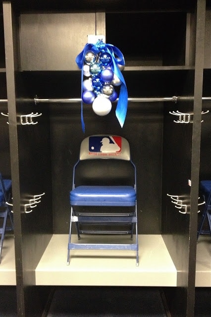 Blue ornaments hanging over an MLB chair