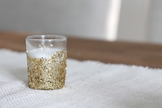 votive candle covered in gold glitter