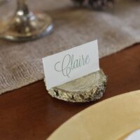 wood chip place card holder with name card at place setting