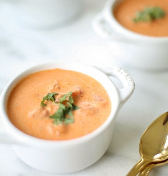 Two bowls of tomato soup.