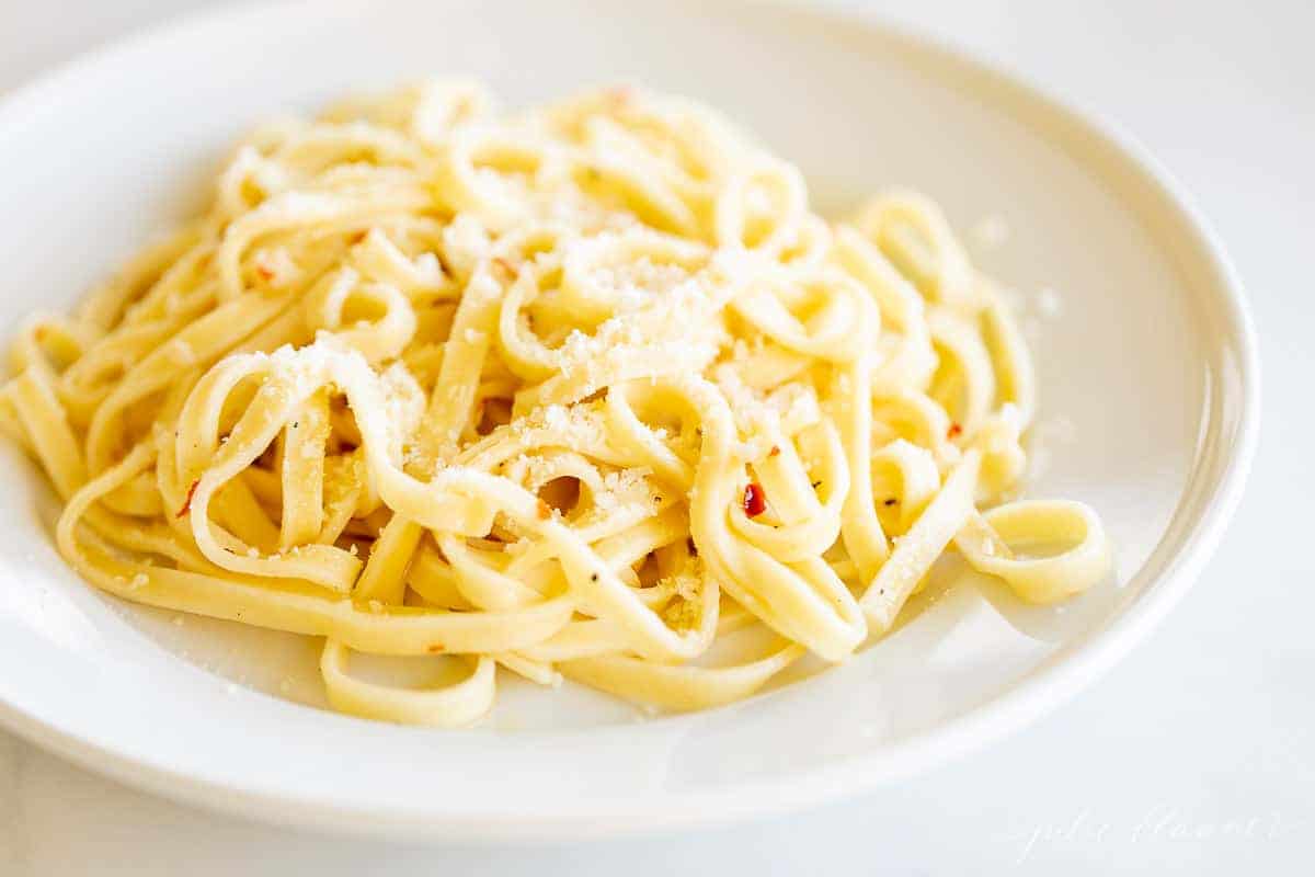 pasta in light sauce on white plate
