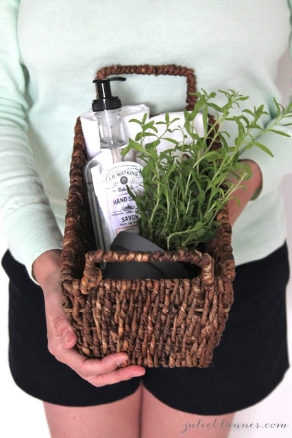 Bathroom or kitchen supplies in a woven basket.