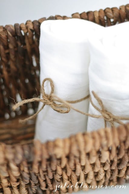 Towels wrapped in burlap string.