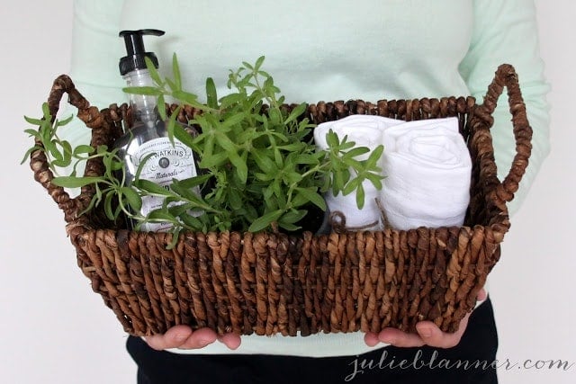 Bathroom or kitchen supplies in a woven basket.