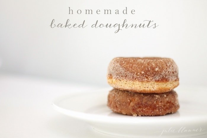 Two cinnamon baked doughnuts on a plate with text overlay
