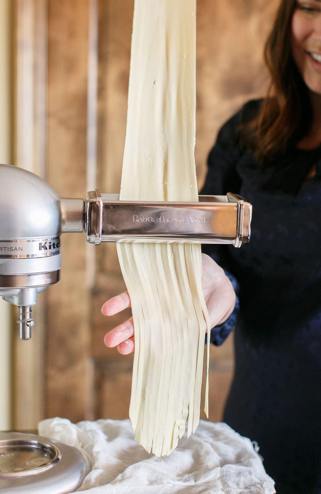 cutting pasta noodles using pasta maker