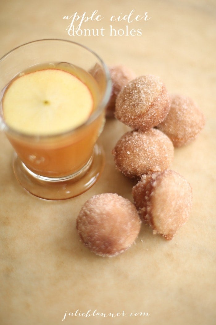 apple cider donut holes with apple cider in a glass with text overlay