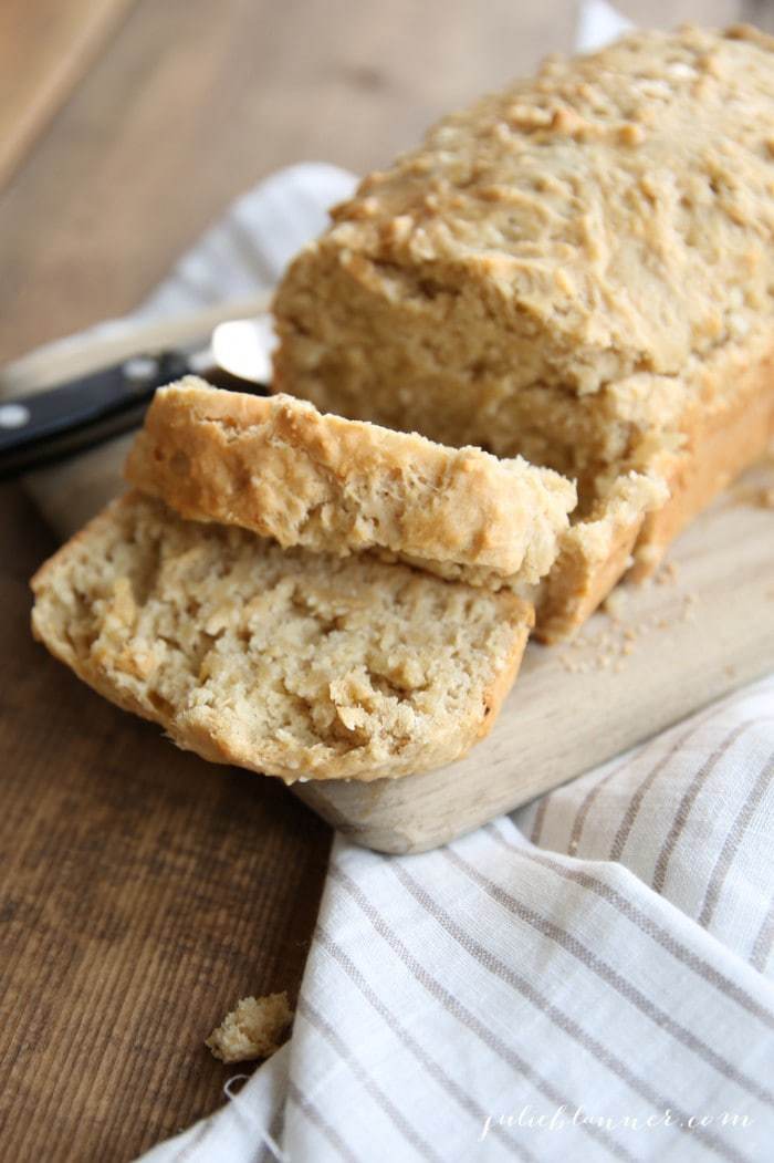 Beer Bread on a chopping board with the end slices cut off