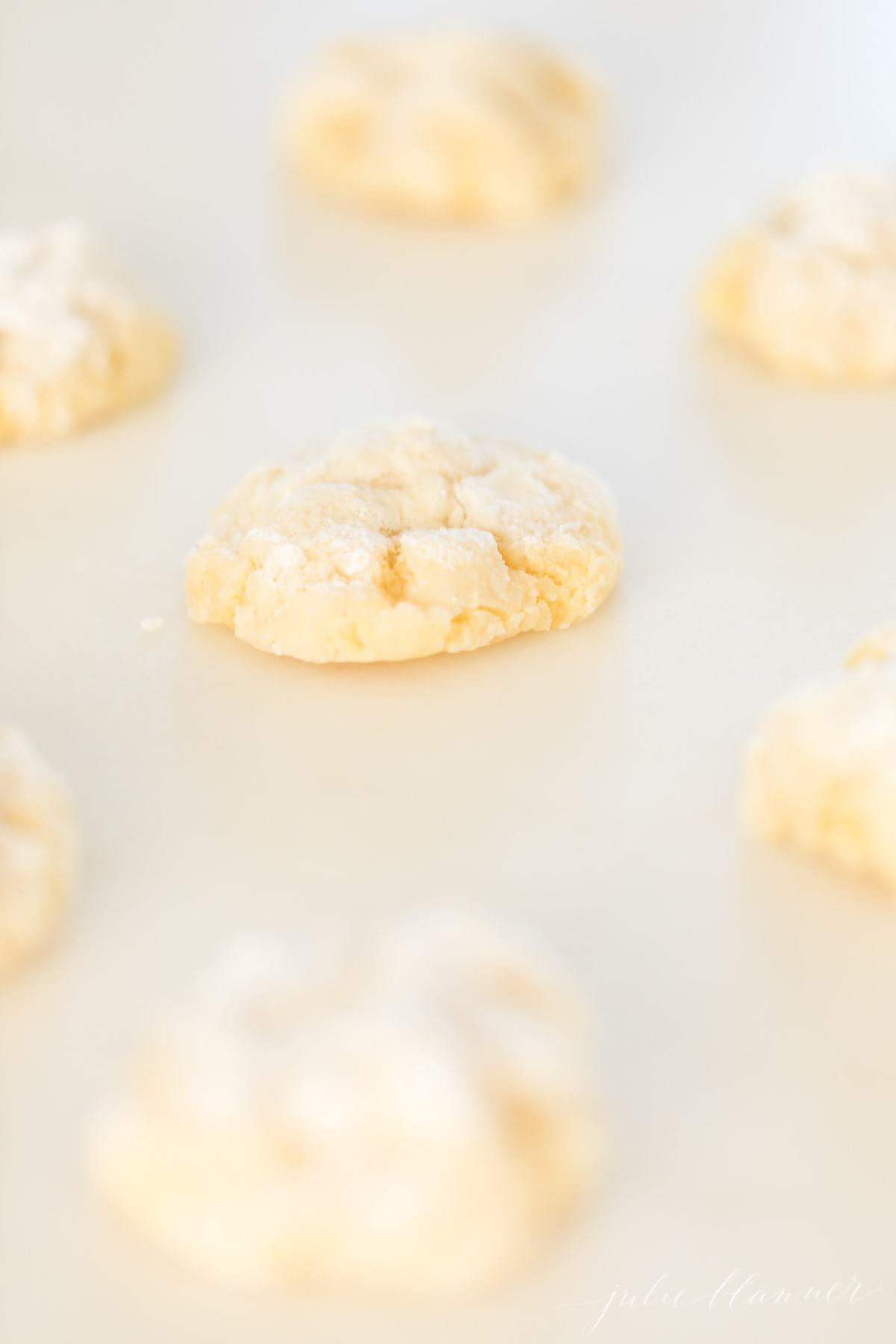 Baked gooey butter cookies on parchment paper