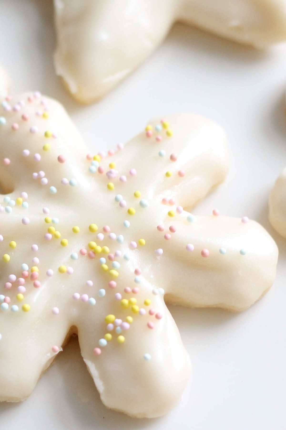 buttercream frosted sugar cookies with sprinkles