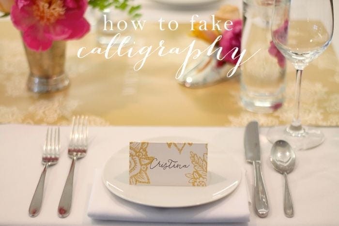 A fake calligraphy name tag on top of a white plate.