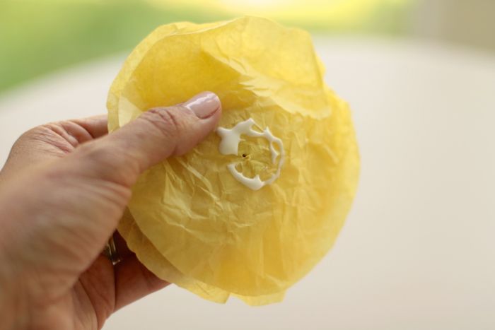 yellow tissue paper circles with glue