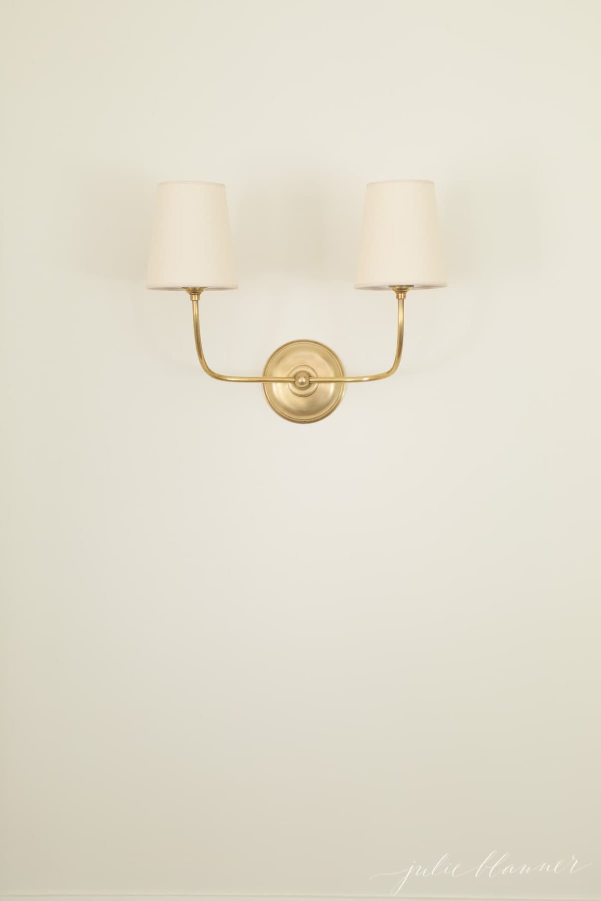 A gold wall lamp.