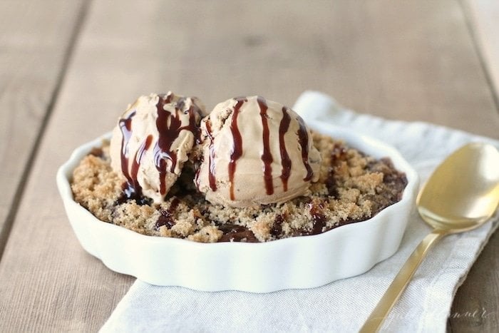 Chocolate Cobbler served in a dish next to a spoon