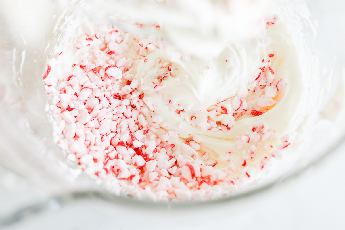 Sweet fruit dip with peppermint sprinkles in a bowl.