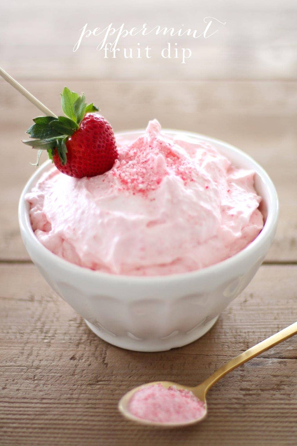 Peppermint fruit dip served in a white bowl with text overlay