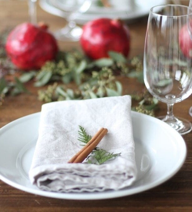 Casual & cozy pomegranate Christmas table setting