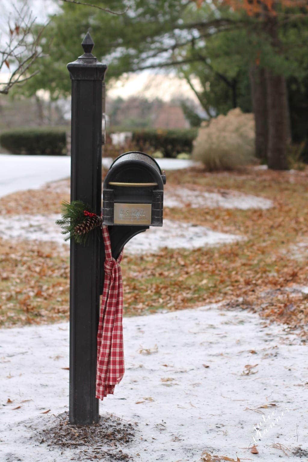 Christmas mailbox decoration a scarf wrapped around the mailbox