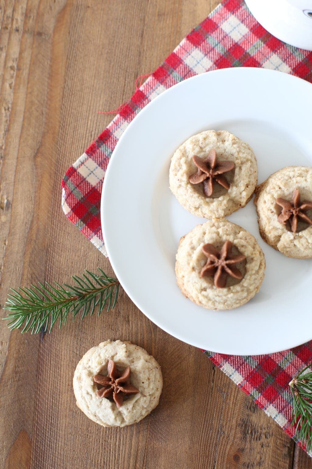 Overhead shot of iced cookies on a plate