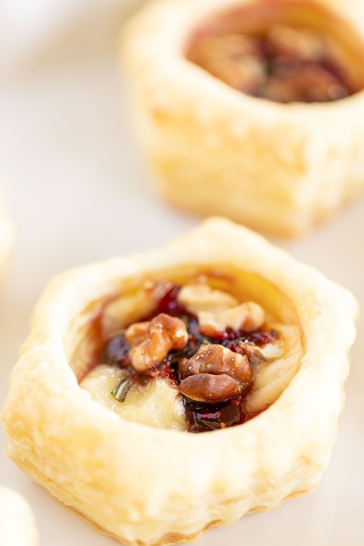 Brie bites recipe topped with pecans