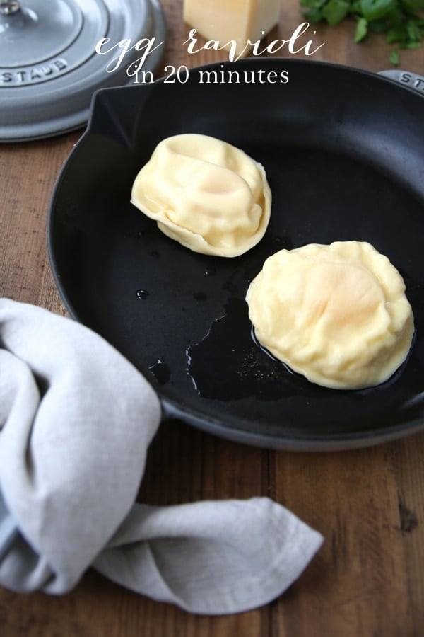 Two egg yolk ravioli in a cast iron skillet