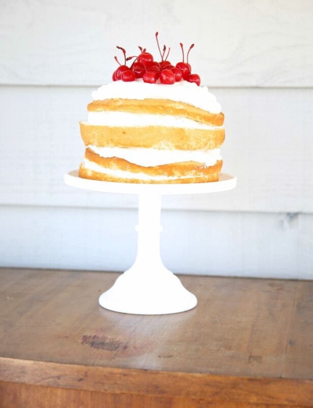 An effortlessly beautiful cherries and cream cake - get the easy details!