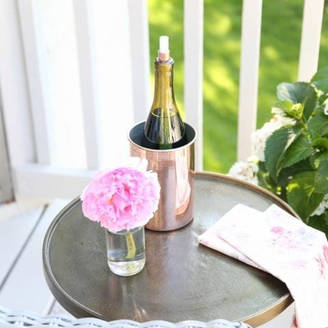 DIY Wine Bottle Tiki Torch | Add ambience while deterring bugs this summer with a tiki torch made from a wine bottle in less than 10 minutes!