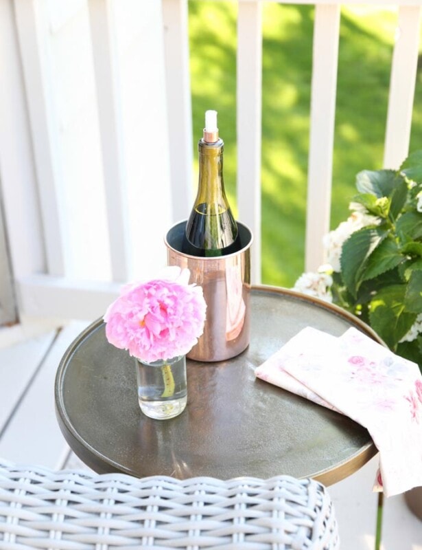 DIY Wine Bottle Tiki Torch | Add ambience while deterring bugs this summer with a tiki torch made from a wine bottle in less than 10 minutes!