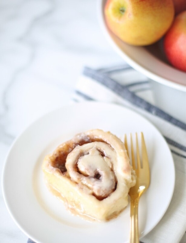 Easy apple cinnamon rolls recipe - get the secret to the lightest, fluffiest, better-than-the-bakery cinnamon rolls with creamy icing.