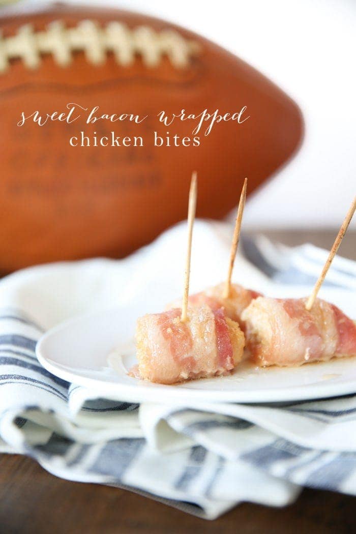 Bacon wrapped chicken bites on a white plate with text overlay