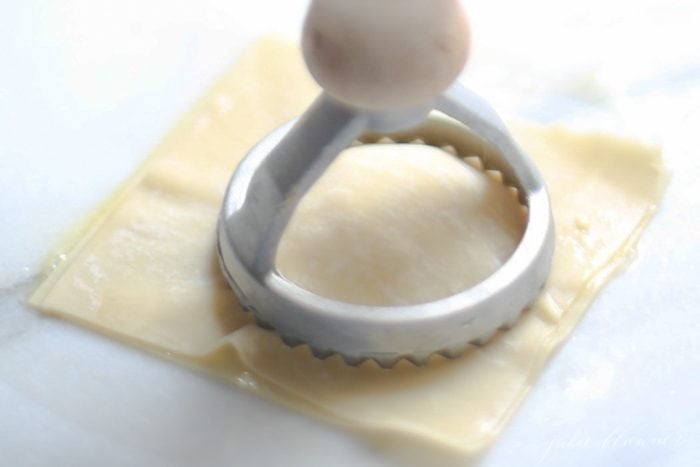 ravioli cutter sealing a cheese filled ravioli