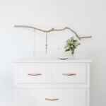 jewelry hanger over chest of drawers