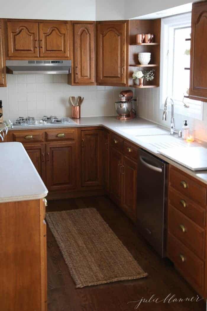 An oak kitchen updated with white kitchen paint looks fresh and modern.