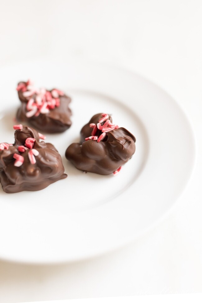 Easy 2 ingredient peanut clusters in microwave stove top or slow cooker