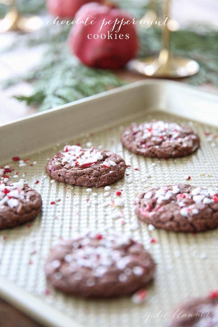 Chocolate peppermint cookies on a baking sheet with text overlay