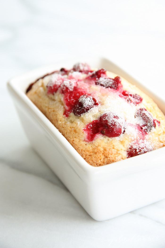 cranberry bread in white loaf pan