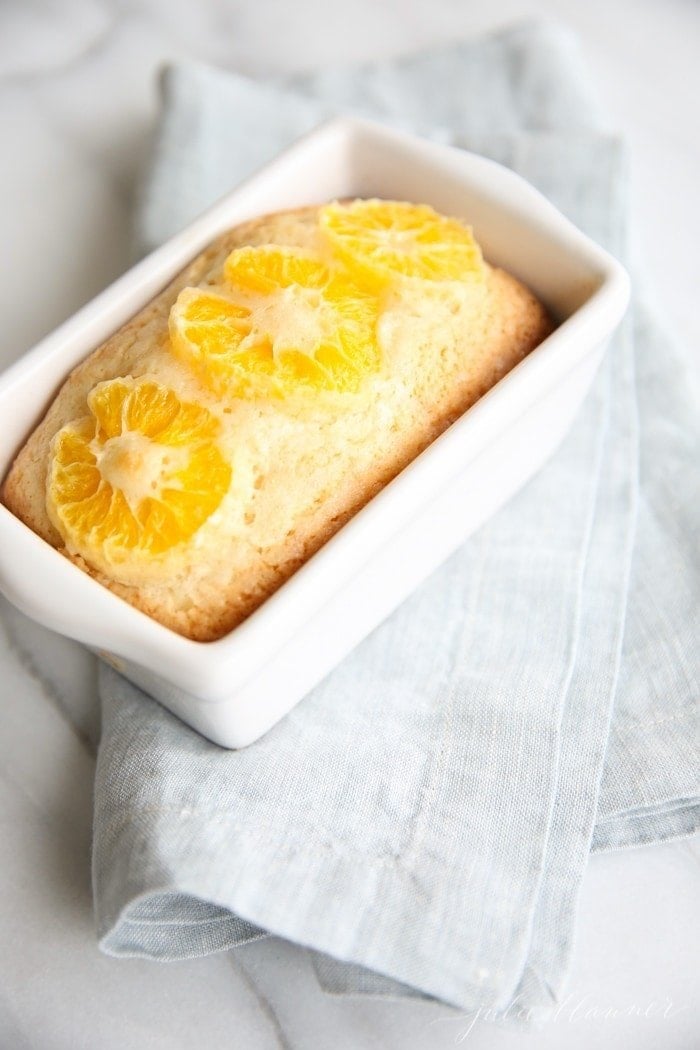 The baked bread in a white dish ready to serve