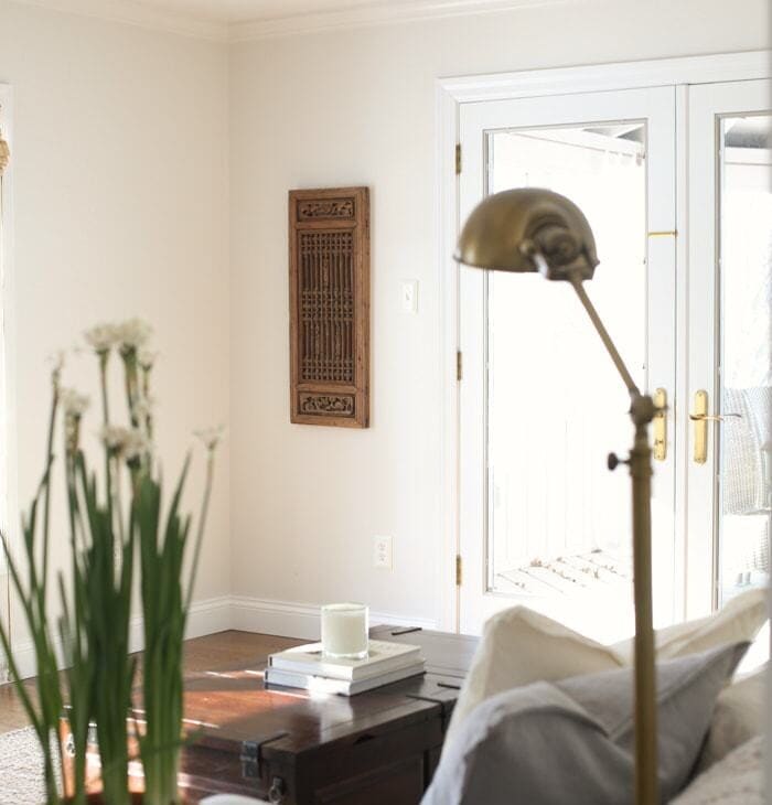 add interest to a room by using antique panels as art