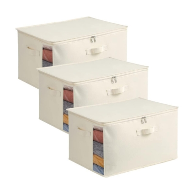 Three storage boxes in a linen closet.